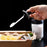 Heat-resistant glass seasoning jar with spoon for kitchen use.