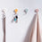 Wall hooks with adhesive backing