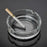 Durable crystal ashtray with a sleek design.