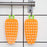 Carrot-shaped fruit brush for scrubbing vegetables